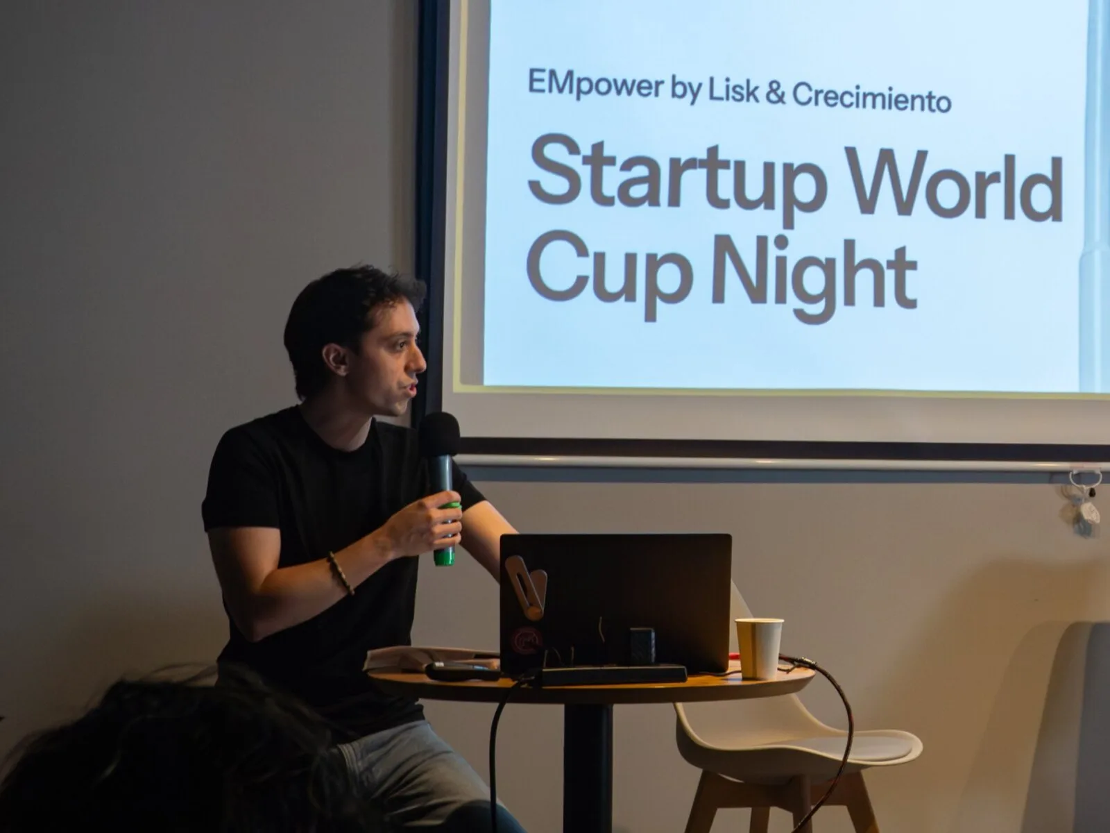 Santino Miele hosting the Crecimiento Conference presenting the Startup World Cup Night by Lisk